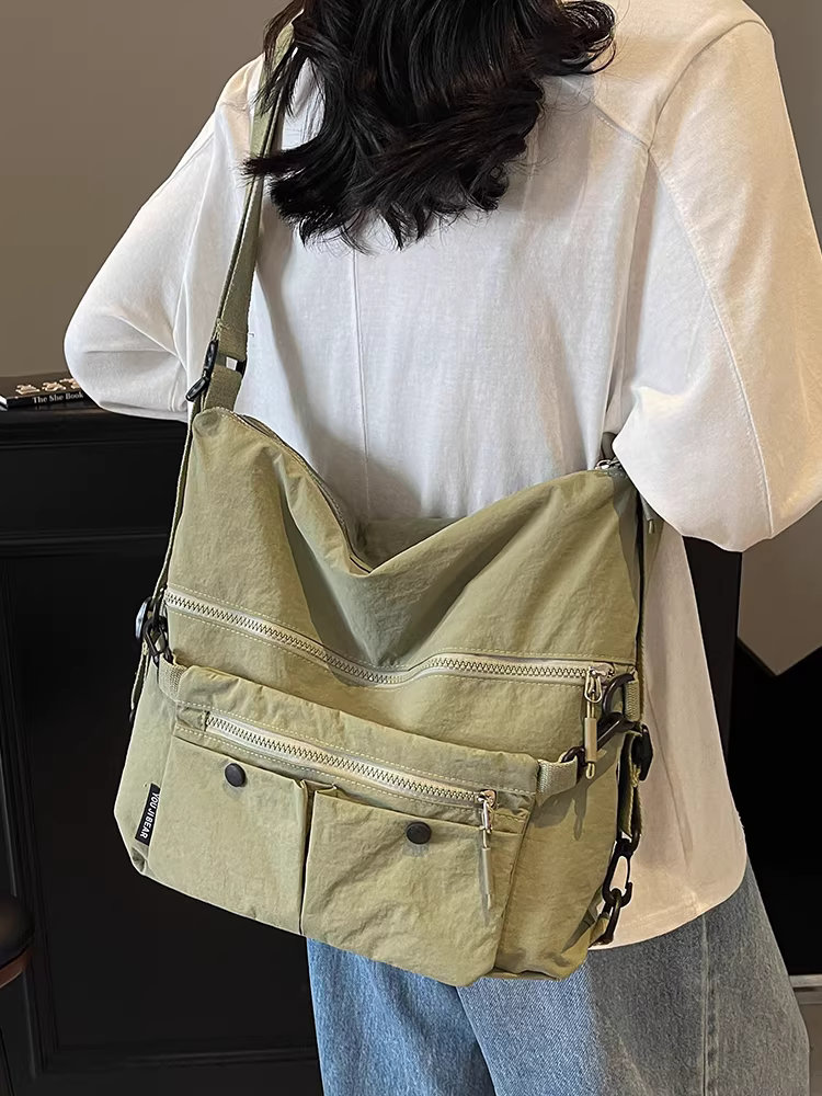 Túi vải canvas dành cho nữ, sức chứa lớn, túi đeo chéo vai mùa hè mới 2025, ba lô đi làm đa năng phong cách Hàn Quốc giản dị