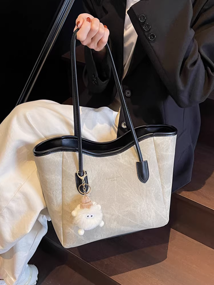 Túi xách nữ cỡ lớn kiểu mới 2025 đơn giản đa năng đeo vai xuân hè phiên bản Hàn Quốc túi tote dành cho sinh viên