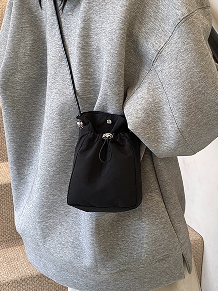 Túi điện thoại vải canvas nữ, đeo chéo, kiểu mới 2025, đa năng, thiết kế độc đáo, ví đựng tiền xu đeo vai đơn, túi nhỏ cao cấp.