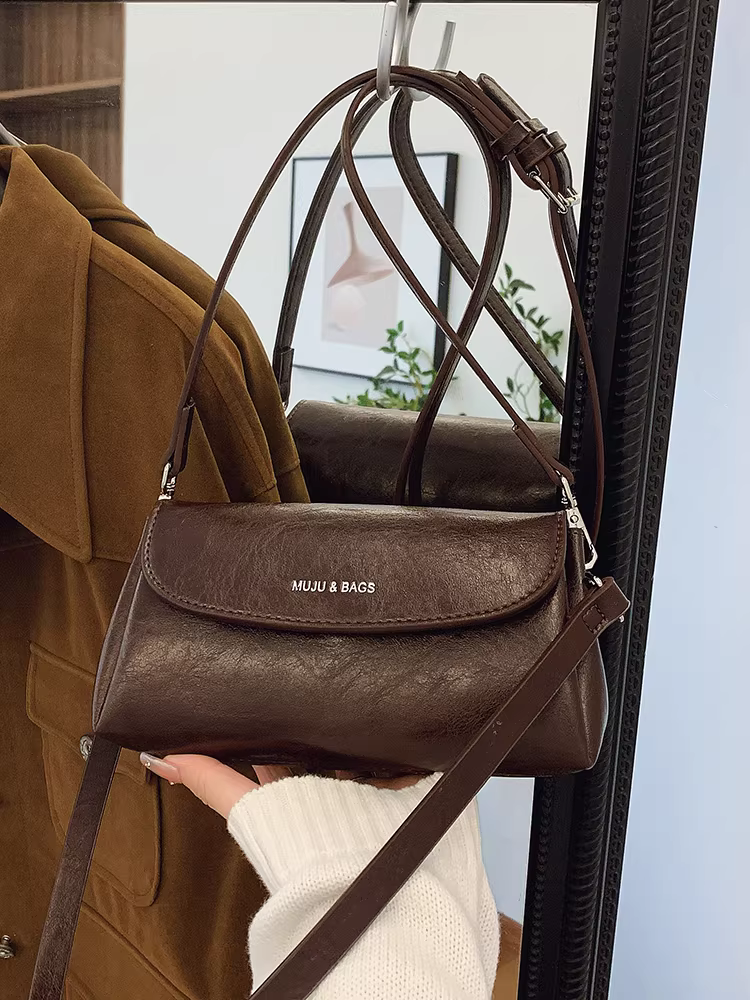 Túi nhỏ retro dành cho nữ Thu Đông 2025 kiểu dáng mới đa năng thiết kế độc đáo đeo chéo một bên vai túi gối da mềm phổ biến