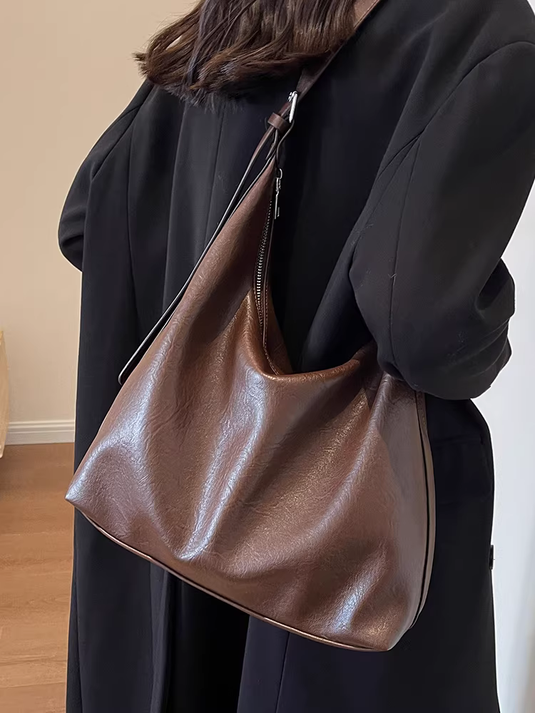 Túi xách nữ dung tích lớn, đa năng cho mùa thu đông, túi đeo chéo vai kiểu retro mới năm 2025, túi tote đơn giản đi học và đi làm.