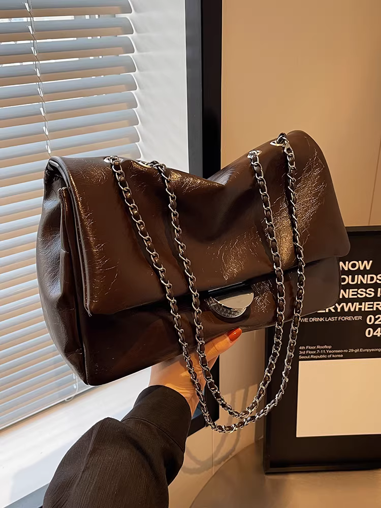 Túi xách nữ dung tích lớn, đa năng cho mùa thu đông, mẫu mới 2025, túi đeo chéo dây xích phong cách giản dị, túi tote đi làm chất liệu có vân.