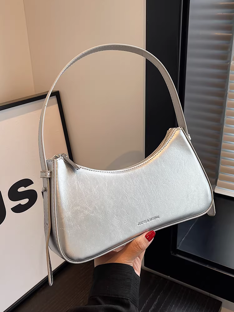 Túi đeo chéo bạc nữ 2025 kiểu Pháp cao cấp mùa thu đông, phong cách nhỏ nhắn, thời thượng, túi baguette