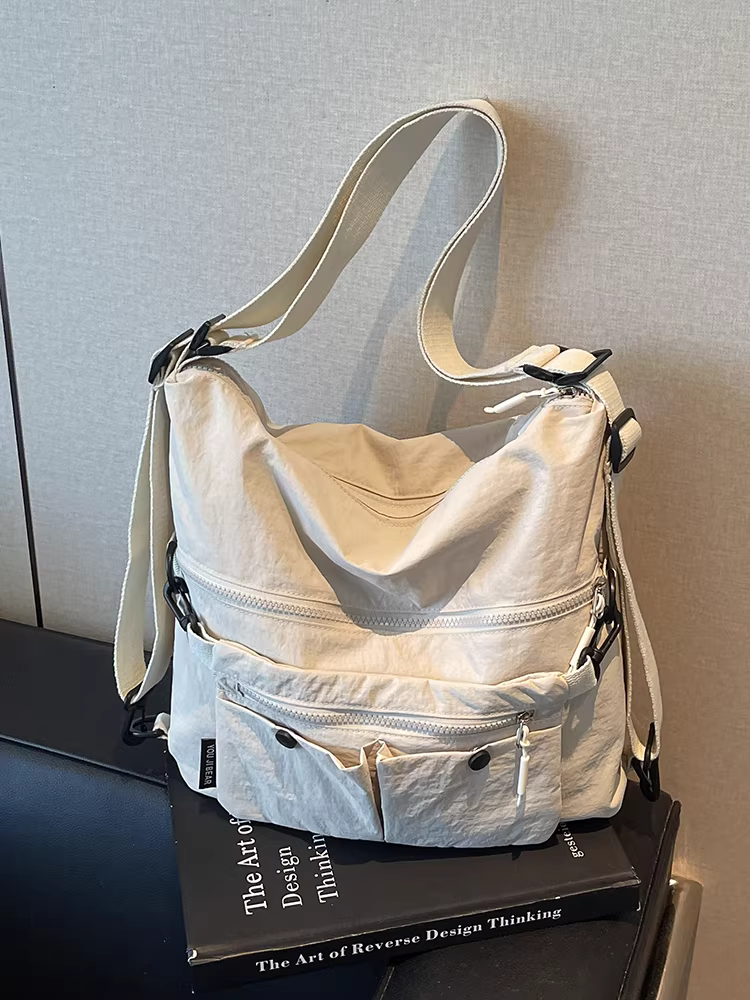 Túi vải canvas dành cho nữ, sức chứa lớn, túi đeo chéo vai mùa hè mới 2025, ba lô đi làm đa năng phong cách Hàn Quốc giản dị