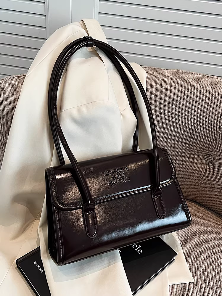 Túi xách nữ dung tích lớn, đa năng cho mùa xuân hè, kiểu dáng mới 2025, phiên bản Hàn Quốc đơn giản, thiết kế độc đáo, túi đeo vai, túi kẹp nách, túi xách tay.