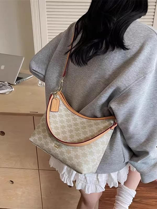 Túi xách nữ cỡ lớn dành cho mùa hè, túi đeo chéo đa năng kiểu dáng mới 2025, phong cách Hàn Quốc, túi bánh bao thời thượng dành cho người đi làm.