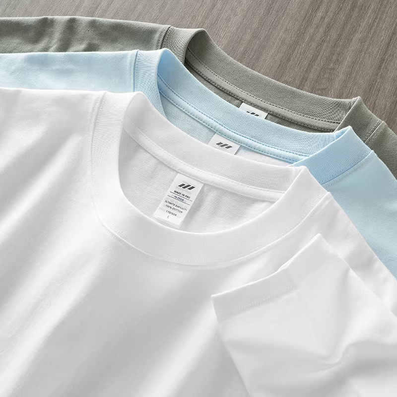 (Mua một tặng một) Áo thun cotton nguyên chất hạng nặng 260G dành cho nam, áo len dài tay mùa xuân thu, áo sơ mi cổ tròn màu trắng tinh khiết