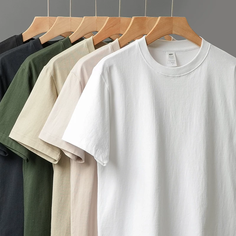 Áo thun ngắn tay hạng nặng 230G dành cho nam và nữ, cổ tròn kiểu Mỹ mùa hè, nửa tay bằng cotton nguyên chất Tân Cương, vai thường, áo sơ mi màu trắng tinh khiết.