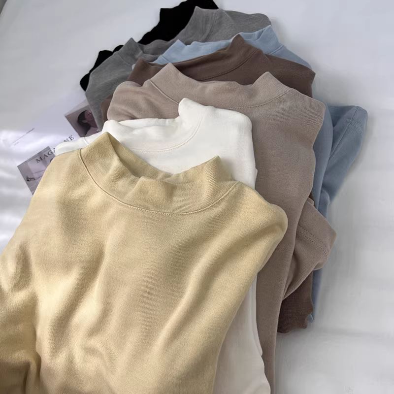 Áo thun cổ đứng chất liệu dệt kim trơn màu ấm áp mùa thu đông dành cho nữ, hàng xuất khẩu, giá rẻ tại quầy hàng.