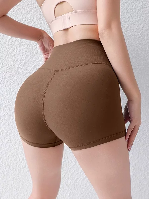 Quần short thể thao nữ kiểu mới, không đường may lộ liễu, cạp cao, nâng mông, bó bụng, quần short yoga cảm giác như không mặc, quần short nữ phong cách dopamine.