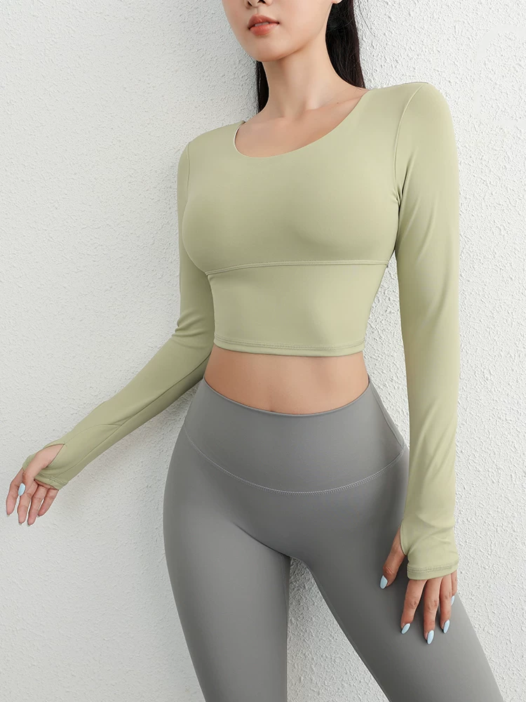 Áo tập yoga dài tay hở lưng Jiumai Yipin dành cho nữ, nhanh khô với miếng đệm ngực tích hợp, trang phục tập thể dục Pilates.