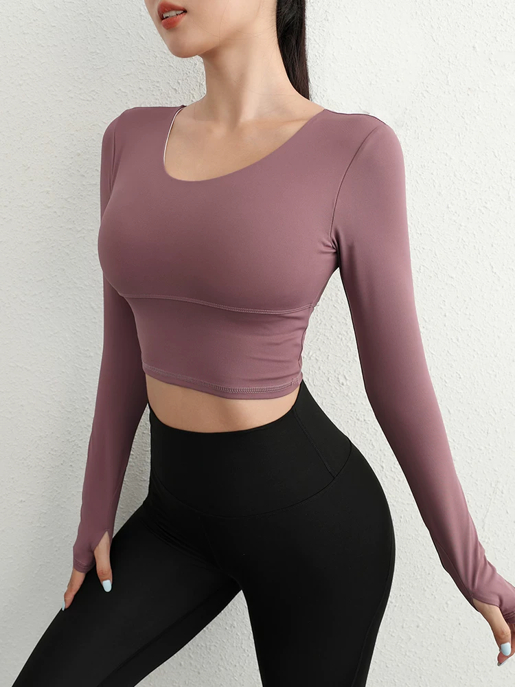 Áo tập yoga dài tay hở lưng Jiumai Yipin dành cho nữ, nhanh khô với miếng đệm ngực tích hợp, trang phục tập thể dục Pilates.