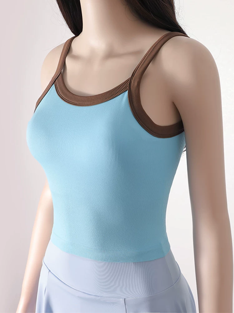 Áo tank top thể thao ôm sát, chất liệu co giãn cao, phối màu macaron, kiểu dáng chữ Y, có mút ngực và hỗ trợ chống sốc.