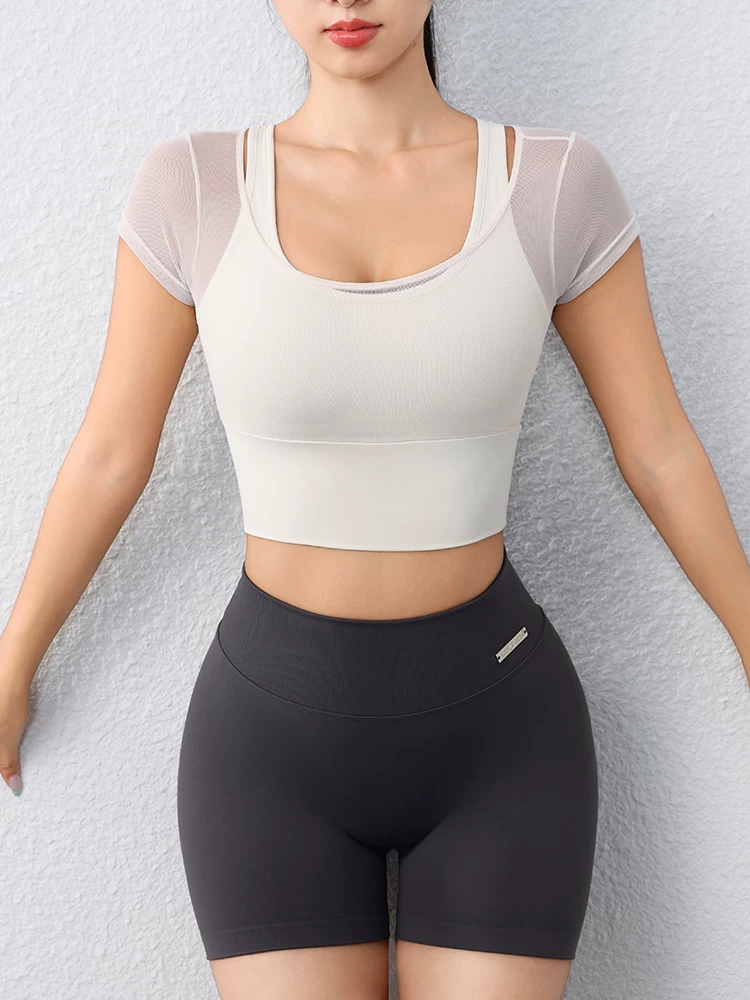 Áo tập yoga nữ thời trang, nhẹ nhàng, có đệm ngực, kiểu áo thun ngắn tay, thiết kế giả hai mảnh, lưng đẹp, đồ tập thể thao.