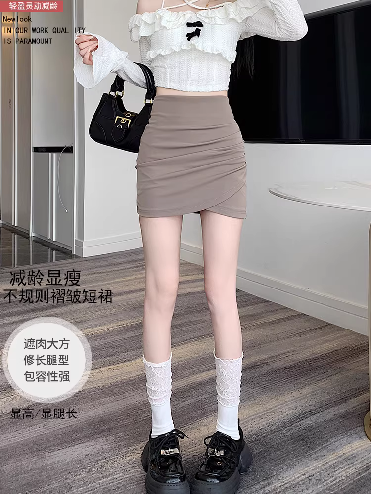 Váy bất đối xứng nữ xuân hè 2025, váy bút chì cao eo ôm hông, váy ngắn thời trang và quyến rũ