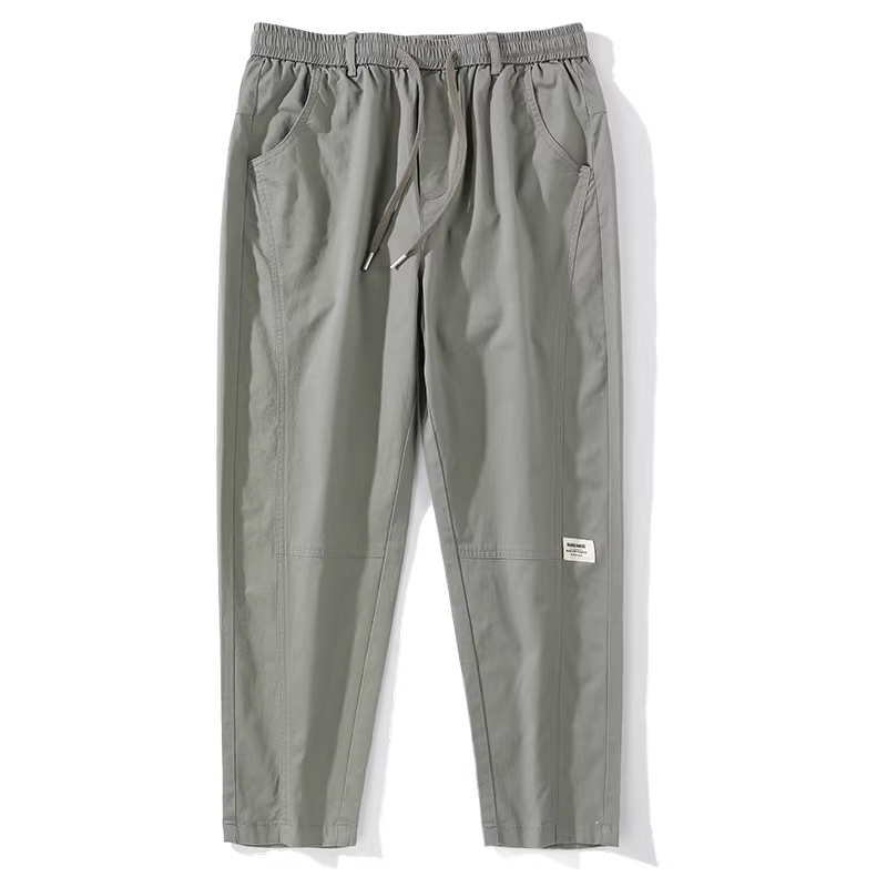 LUUD mùa hè mỏng dây rút co giãn quần âu nam phong cách Hàn Quốc mới dáng ôm vừa vặn quần harem