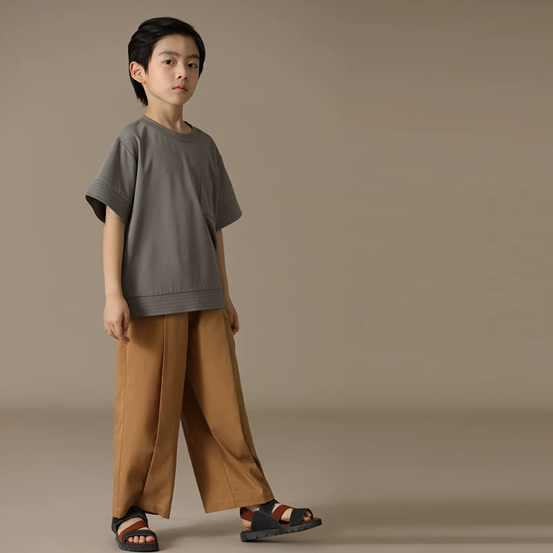 Quần áo trẻ em phong cách xuân hè quần âu thường ngày cho bé trai và bé gái kiểu dáng cổ điển vải lụa mát lạnh chống nhăn quần ống đứng cho trẻ em