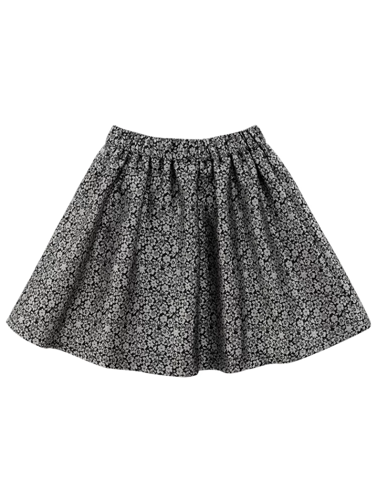 Quần áo trẻ em Hazi Váy trẻ em mùa đông Váy chữ A bằng vải jacquard màu đen có lớp lót lông cừu Váy ngắn ấm áp Quần áo mùa đông cho bé gái Phong cách mới