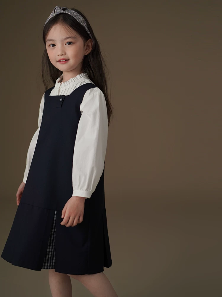 Quần áo trẻ em mùa xuân hè váy vest màu xanh hải quân đơn giản cao cấp phong cách học sinh váy mùa xuân mới cho bé gái