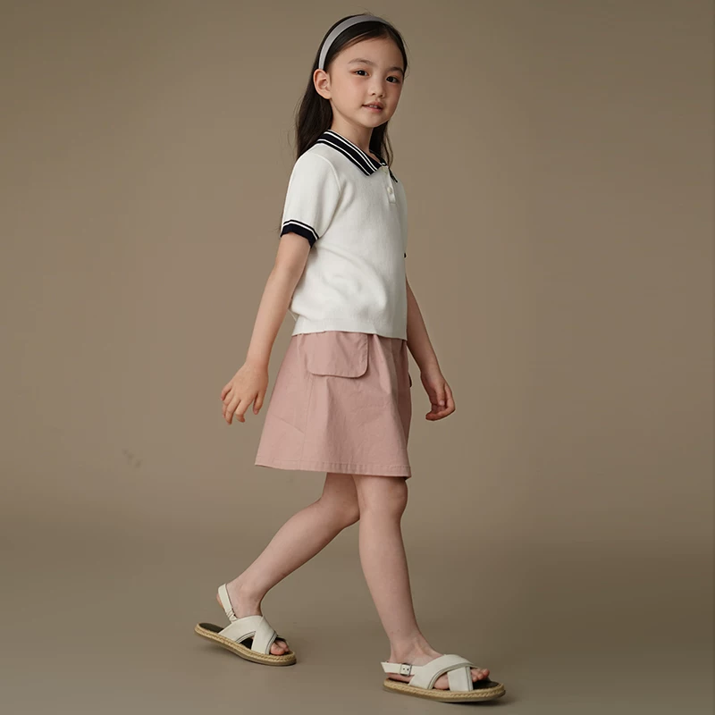 Quần áo trẻ em Hazi Mùa hè Váy ngắn cotton màu hồng ngọt ngào mới dành cho bé gái lớn hơn, Váy công sở đơn giản và đa năng.