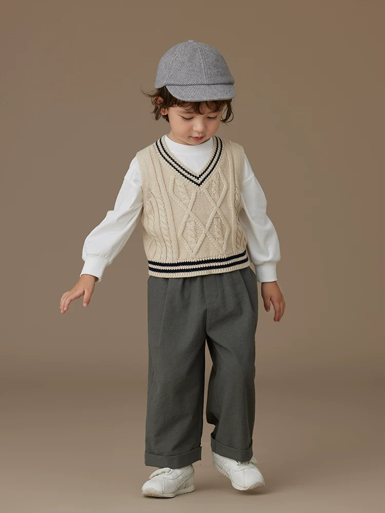 Quần áo trẻ em mùa xuân thu áo vest dệt kim đơn giản giản dị áo dệt kim bé trai và bé gái áo vest cổ chữ V áo khoác ngoài