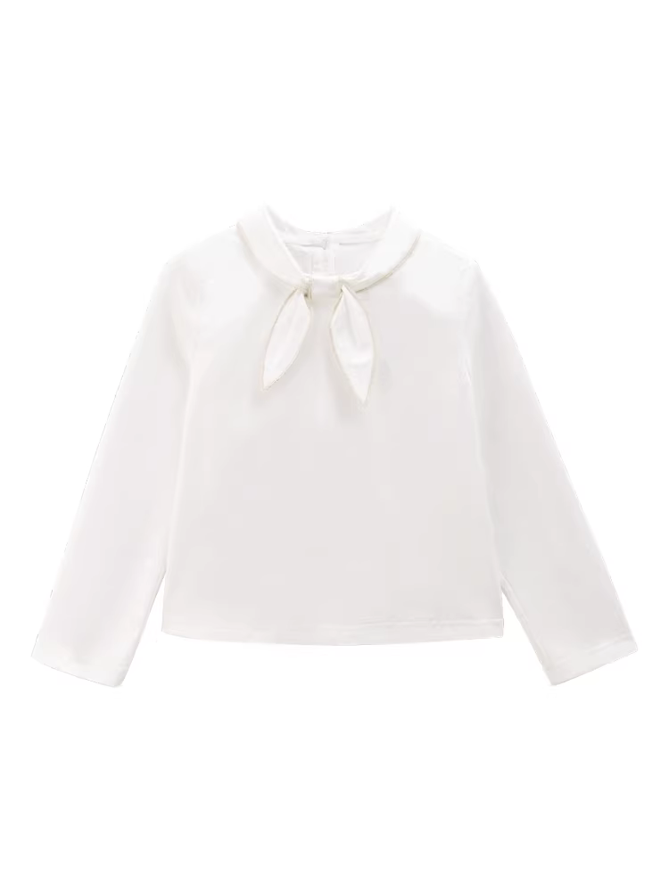Áo thun bé gái tay dài màu trắng, kiểu dáng dễ thương, phối nơ, chất liệu len, thích hợp cho mùa xuân thu.