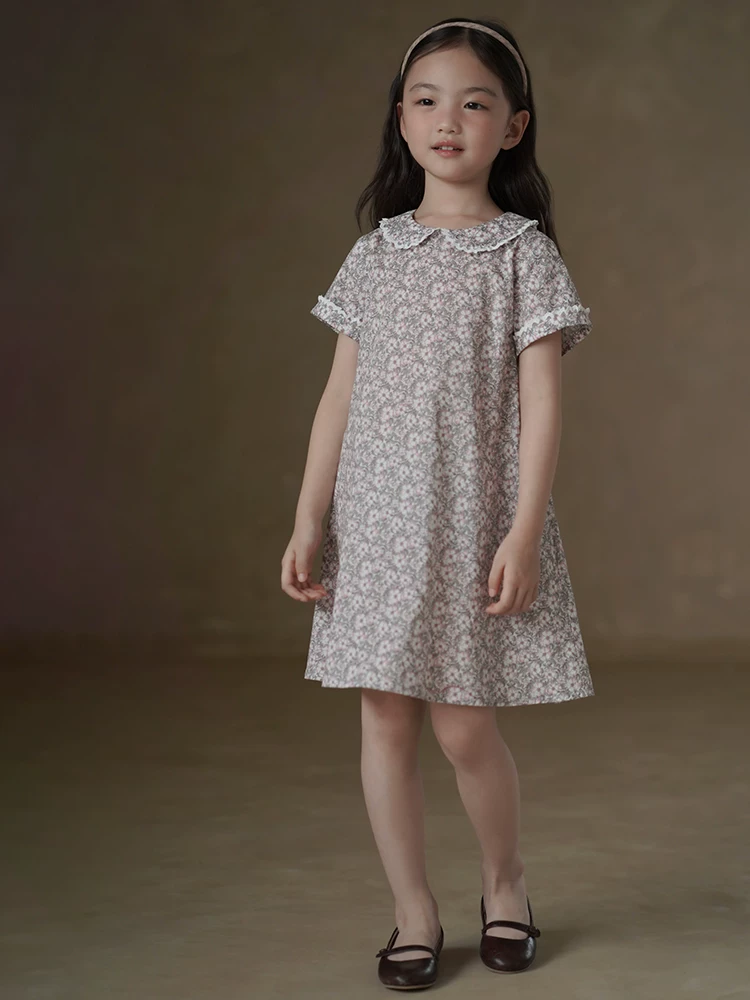 Quần áo trẻ em mùa hè váy hoa phong cách Hàn Quốc cho bé gái váy ngắn tay dài vừa phải váy mùa hè cho bé gái retro mục vụ