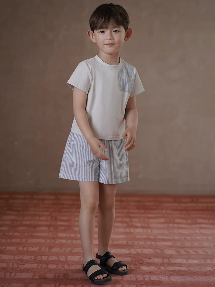 Quần áo trẻ em mùa hè áo dệt kim áo sơ mi chắp vá bé trai bé gái áo thun ngắn tay trang phục mùa hè mới cho trẻ lớn hơn