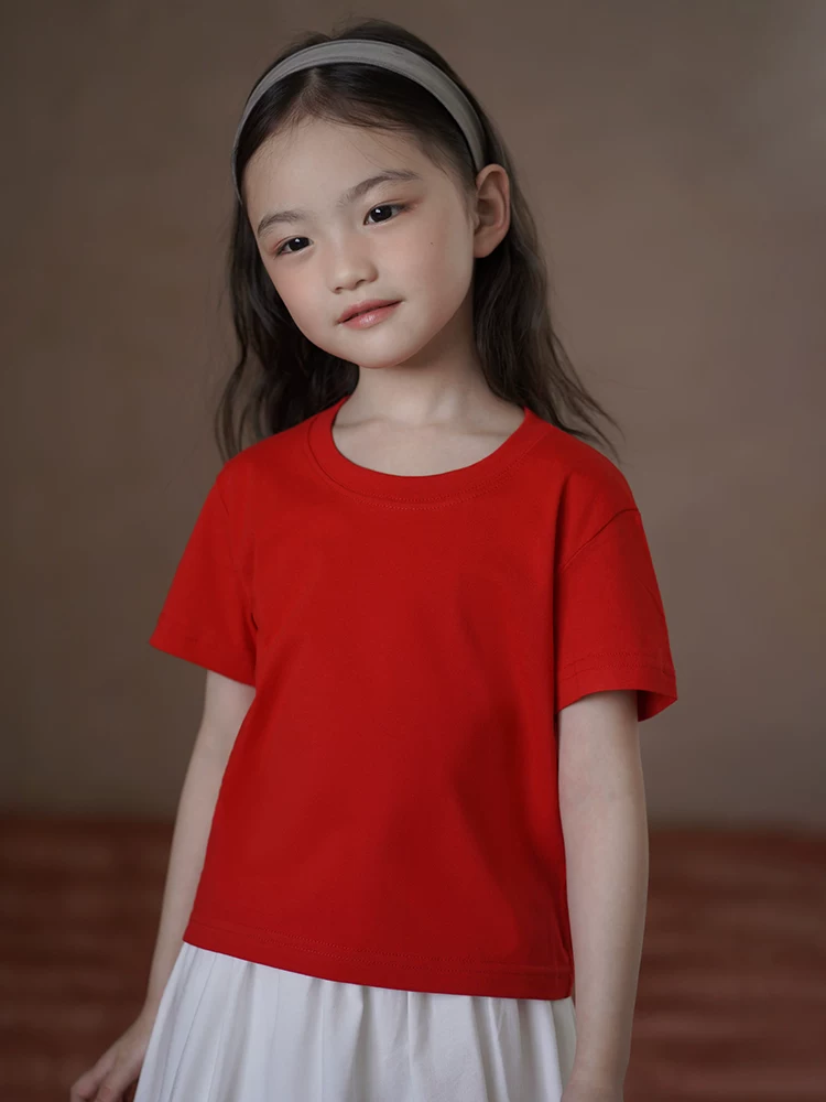 Quần áo trẻ em Hazi Áo thun trẻ em cổ tròn thông thường đa năng nhiều màu sắc tùy chọn mùa hè cho bé trai và bé gái tay ngắn 2025 Áo thun trắng mới