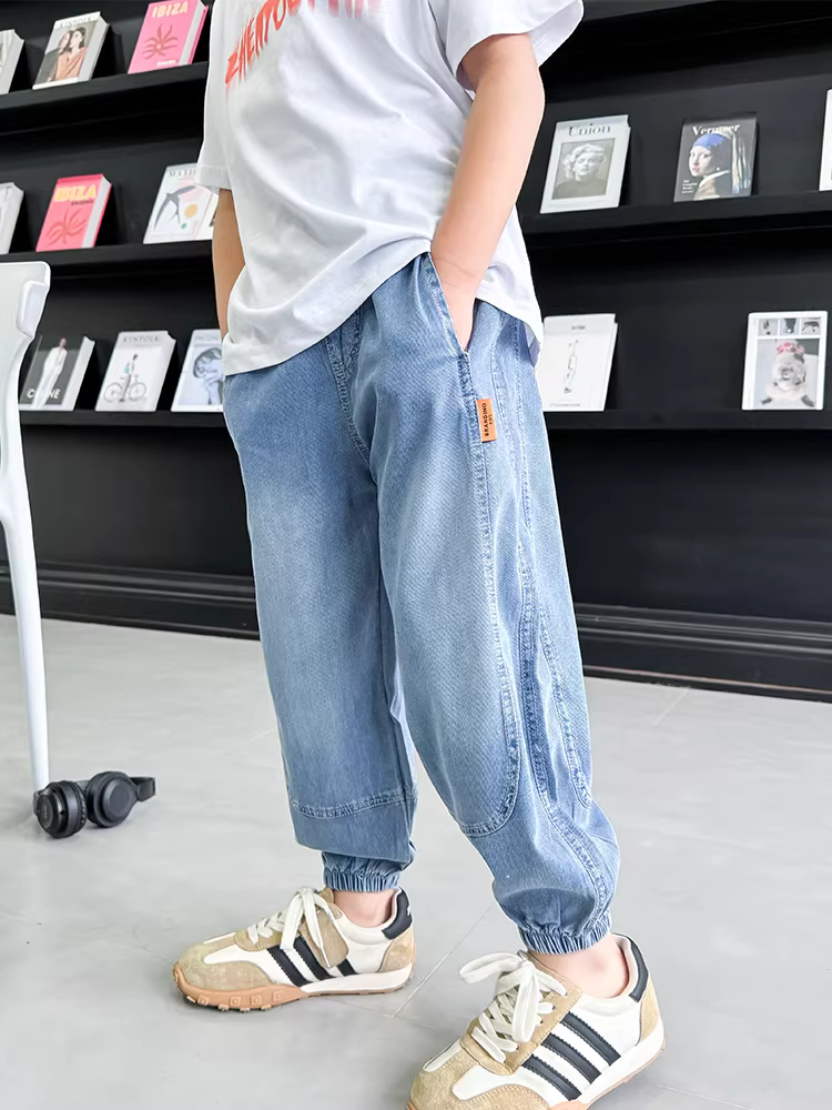 Quần bé trai mùa hè kiểu dáng mỏng, quần jean Tencel trẻ em kiểu dáng hè, quần chống muỗi cho bé trai đẹp trai, mặc hè mẫu mới 2025