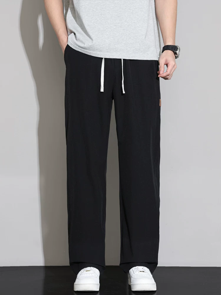 Quần dài dáng rộng cao cấp của Jeanswest dành cho nam, mùa xuân thu phong cách Mỹ, thương hiệu thời thượng, quần dài dáng suông đa năng, phong cách thời trang.