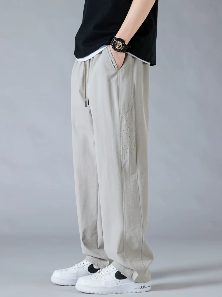 Quần dài nam Jeanswest chất liệu vải lưới tơ đá, nhanh khô, dáng thẳng, rộng rãi, phong cách Mỹ, thời trang, đa năng, ống rộng, thích hợp cho mùa hè.