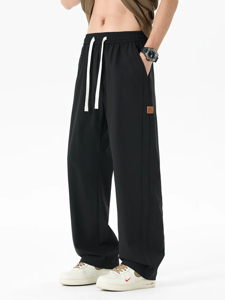 Quần dài Jeanswest dáng rộng, chất liệu lụa băng mỏng, phong cách thường ngày dành cho nam, quần dài thương hiệu thời trang cao cấp mùa hè.