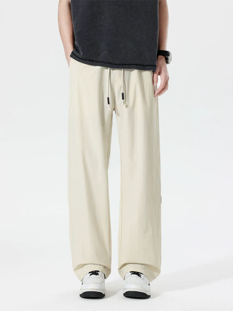 Quần dài ống rộng kiểu Mỹ thời thượng của Jeanswest dành cho nam, mùa xuân hè, cảm giác cao cấp, dáng rộng, quần dài đa năng.