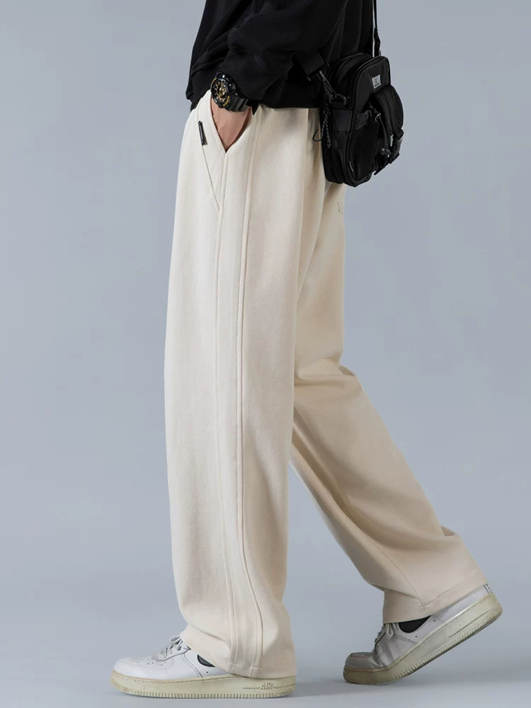 Quần dài ống rộng dáng thẳng Jeanswest 2026 mới dành cho nam, mùa xuân thu, quần thể thao cao cấp, dáng rộng.
