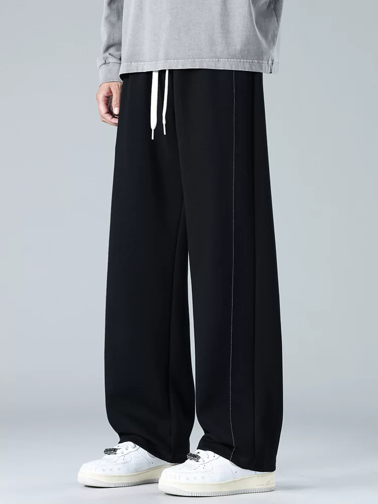 Quần thể thao dáng rộng cao cấp của Jeanswest dành cho nam, quần dài màu xám thể thao thoáng khí hợp thời trang mùa xuân hè.