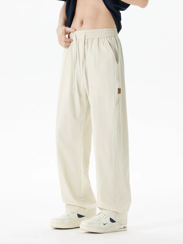 Quần dài Jeanswest dáng rộng, chất liệu lụa băng mỏng, phong cách thường ngày dành cho nam, quần dài thương hiệu thời trang cao cấp mùa hè.