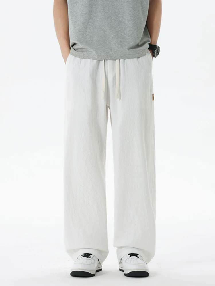 Quần jeanswest ống rộng thời trang phong cách Mỹ dành cho nam, mùa xuân thu, quần thể thao rộng rãi đa năng cao cấp.