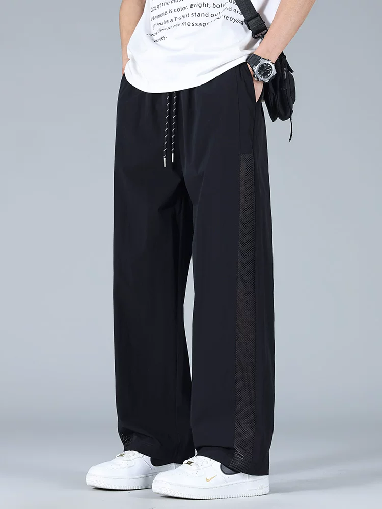 Quần dài ống đứng chất liệu lụa băng kiểu Mỹ của Jeanswest dành cho nam, quần dài thoáng mát mùa hè, dáng rộng hợp thời trang, thân thiện với làn da, thoáng khí.