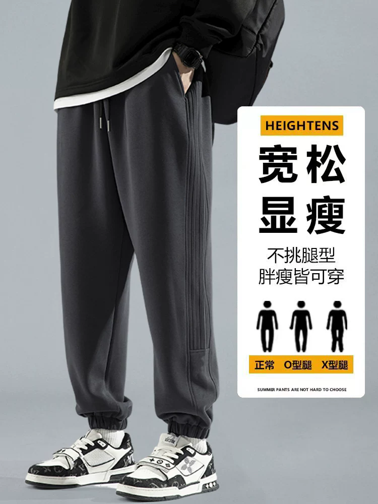 Quần jogger thể thao màu đen phong cách Mỹ của Jeanswest dành cho nam, quần dài dáng rộng thoải mái mới mùa xuân 2026.