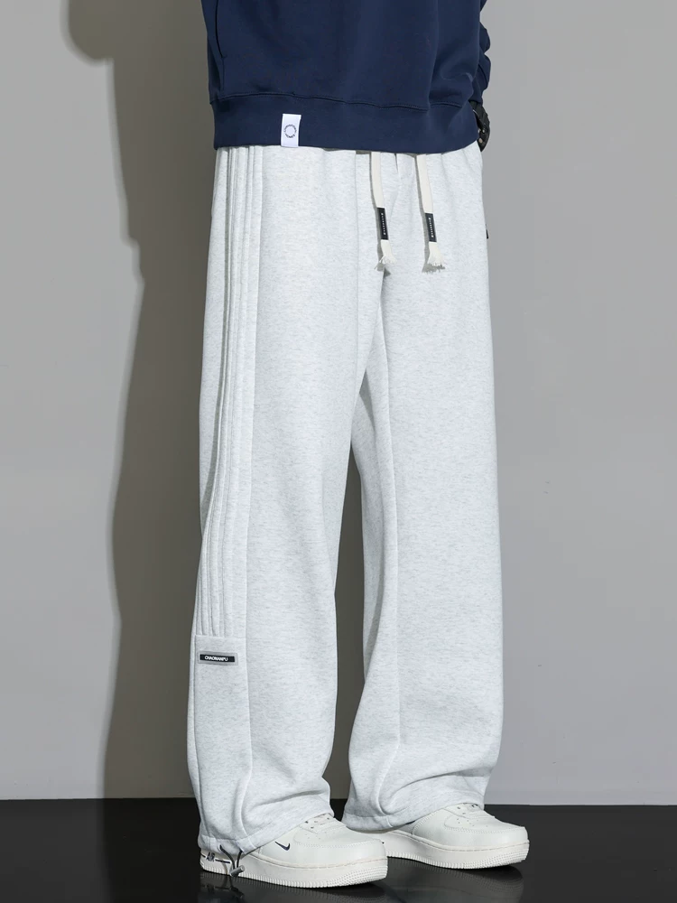 Quần jogger nam Jeanswest 2026 mới, dáng rộng, màu xám, chất liệu mềm mại, đa năng, phong cách thể thao, dài.