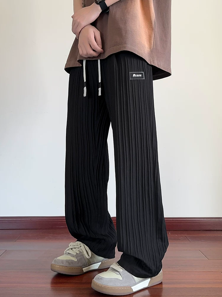 Quần âu nam Jeanswest 2025 kiểu mới, dáng rộng thoải mái, thời trang Hàn Quốc, đa năng, chất liệu mỏng mùa hè, ống rộng dài chạm đất.