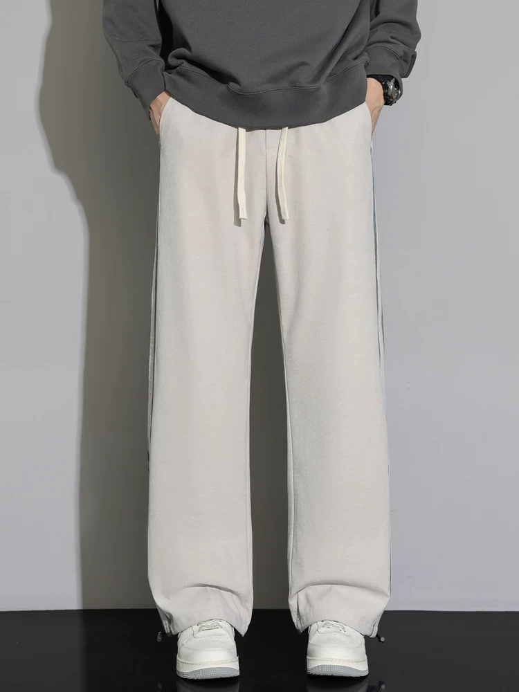 Quần jogger sọc thẳng kiểu Mỹ thời thượng của Jeanswest dành cho nam, mùa xuân thu, cảm giác cao cấp, dáng suông, rộng rãi, quần dài đa năng.