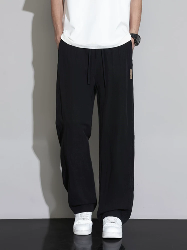Quần dài ống đứng Lyocell cao cấp của Jeanswest dành cho nam, quần dài dáng rộng đa năng phong cách Mỹ mùa xuân thu.