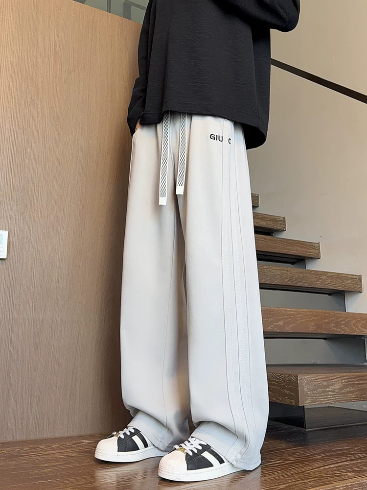 Quần dài ống rộng kiểu Mỹ của Jeanswest dành cho nam, mùa xuân thu, thương hiệu thời thượng cao cấp, quần dài dáng rộng, sành điệu, đa năng.