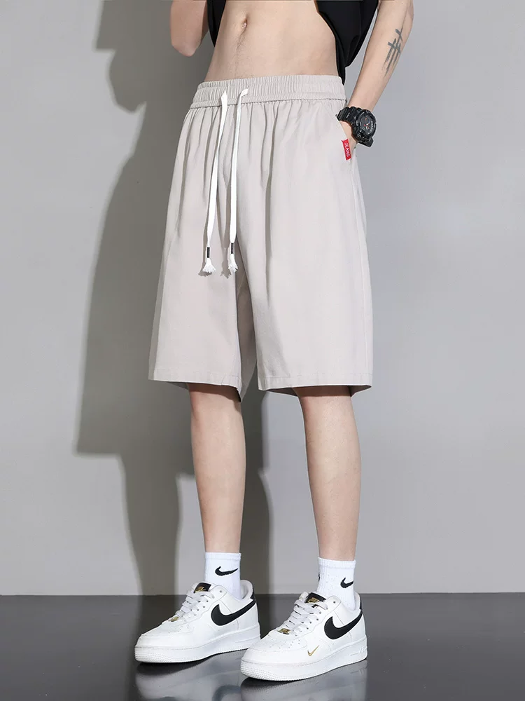 Quần short cotton nguyên chất Jeanswest dành cho nam, quần short thể thao mỏng thoáng khí mùa hè, dáng rộng, quần dài vừa phải, đa năng, phong cách thường ngày.