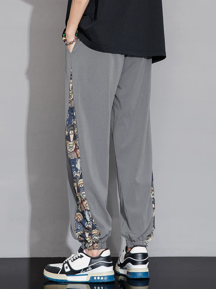 Quần jogger nam Jeanswest kiểu Mỹ thời trang, chất liệu lụa đá mỏng, mùa hè 2025, mới, thoáng khí, đa năng, dáng rộng, quần thể thao.