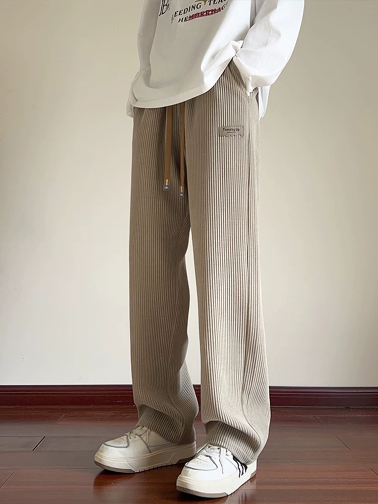 Quần jeanswest đơn giản màu trơn đa năng dành cho nam giới, quần ống rộng thẳng hợp thời trang mùa xuân mới.