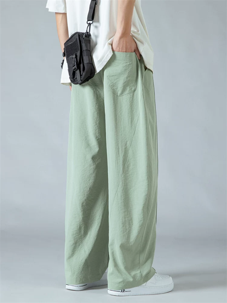 Quần âu nam Jeanswest 2025 chất liệu lụa đá mỏng, nhanh khô, dáng thẳng, mùa hè, đơn giản, rộng rãi, đa năng, phong cách thường ngày.