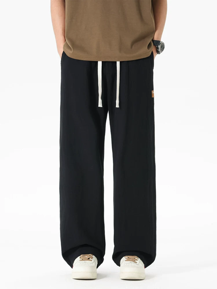 Quần jeanswest ống rộng thời trang phong cách Mỹ dành cho nam, mùa xuân thu, quần thể thao rộng rãi đa năng cao cấp.